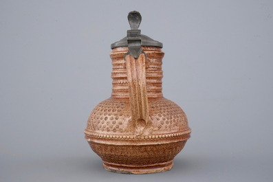 A lot of 3 saltglazed stoneware jugs incl. a Raeren pilgrim's flask or gourd, 17th and 19th C.